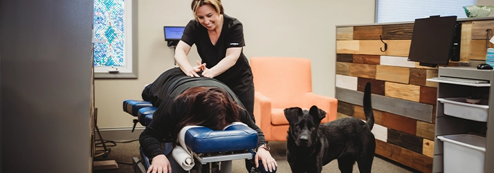 Chiropractor Bloomington IL Jess Bruin Adjusting Patient